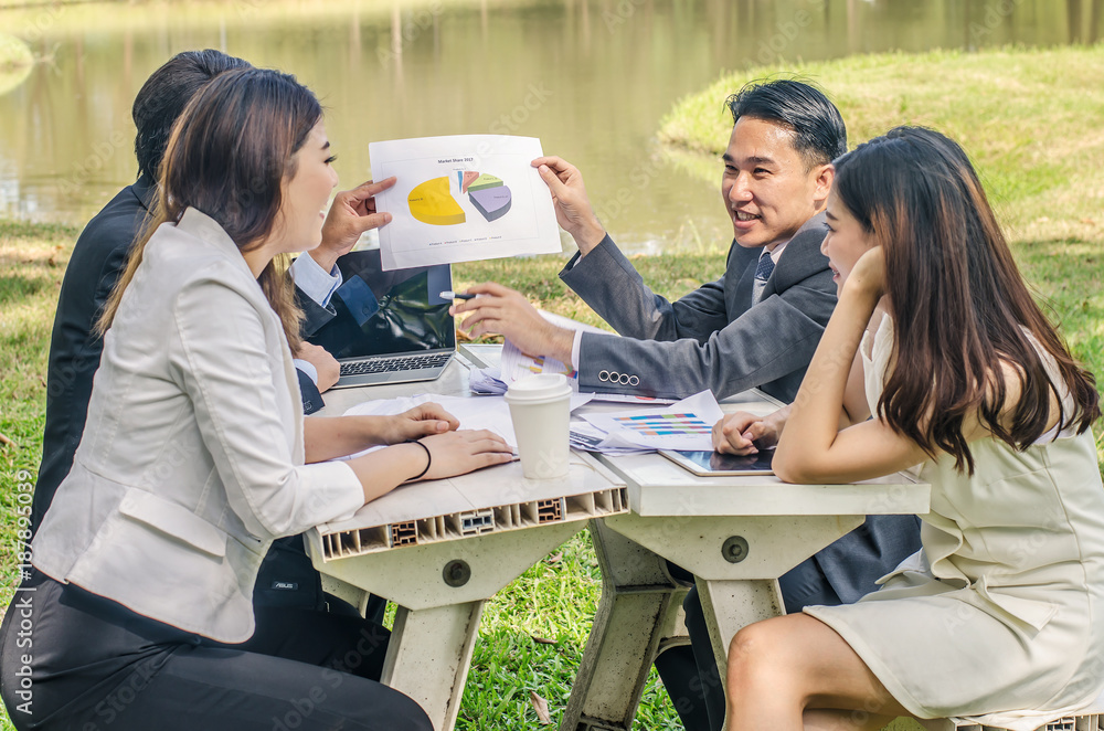 Casual Business People adult Man and Woman working together conference presentation at workplace located outdoor Casual Business People adult Man and Woman working together conference presentation at workplace located outdoor