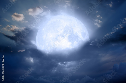 Night sky with moon in the clouds "Elements of this image furnished by NASA