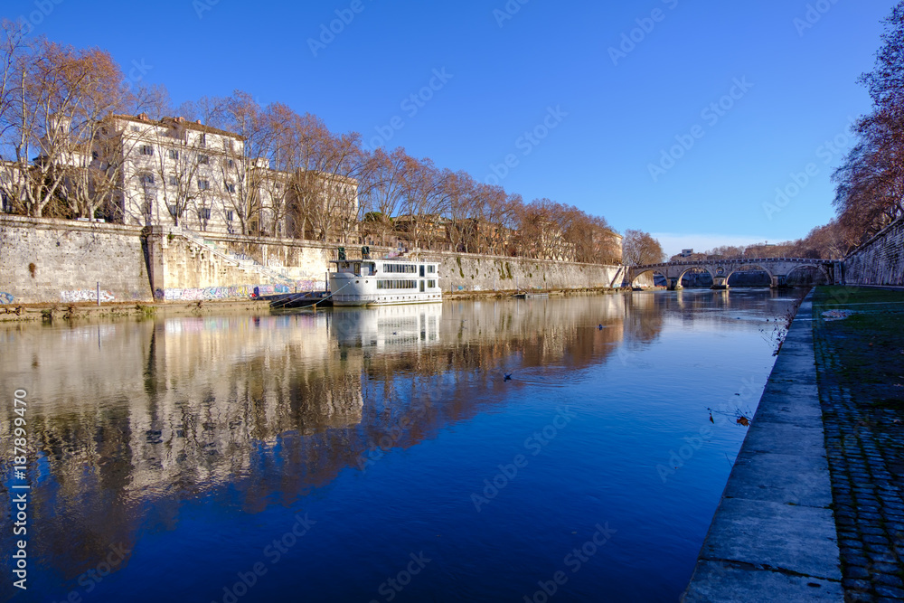 Travel photography - walking along the banks of the Tiber (Rome, Italy, Europe).