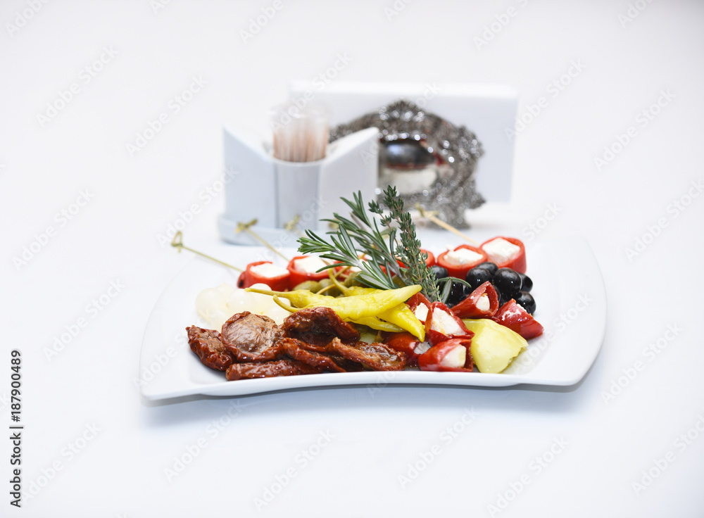 Vegetarian dish with pickled vegetables decorated with herbs. Vegetarian dish with pickled vegetables decorated with herbs.