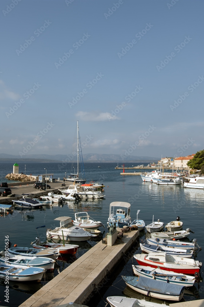 Port in Bol town on the island of Brac with shore side boats