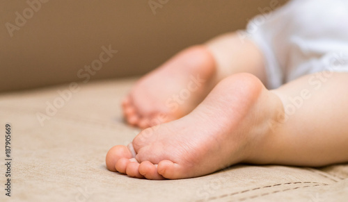 Baby legs. The child is sleeping © Funtap