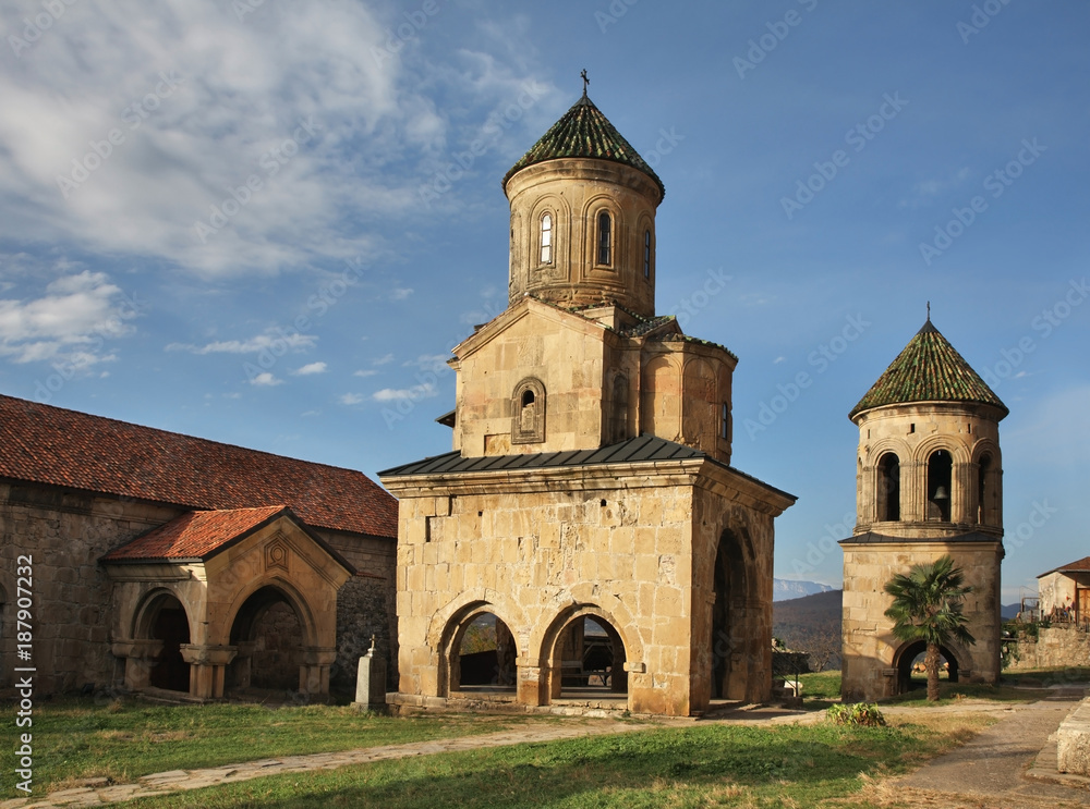 Church of St. Nicholas and bell tower at Gelati Monastery of Theotokos near Kutaisi. Imereti Province. Georgia