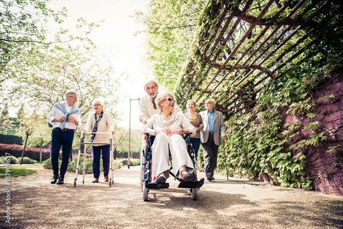 Senior people walking outdoors