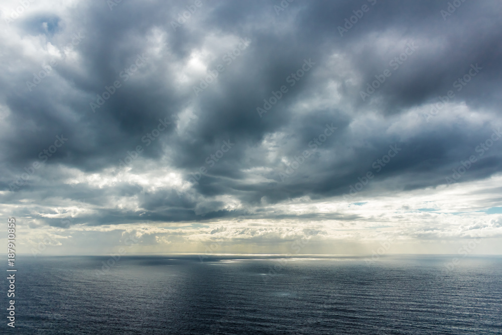 Dark clouds over atlantic ocean.