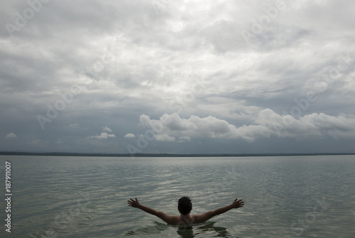 Man chapin in Peten lake, Itza, Guatemala center america, honeymoon, freedom in outdoor vacations.
