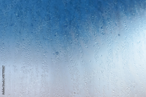 Wetted glass, water droplets, soft focus
