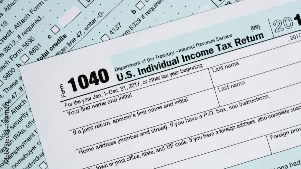 Slow rotation of macro close up of 2017 IRS form 1040 Slow rotation of macro close up of 2017 IRS form 1040