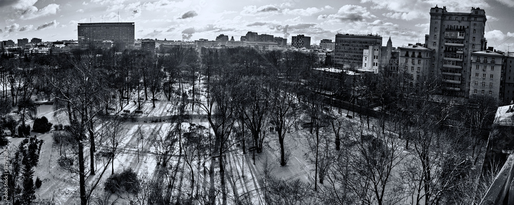 Snowbound deserted city park in the cold winter
Snowbound deserted city park in the cold winter
