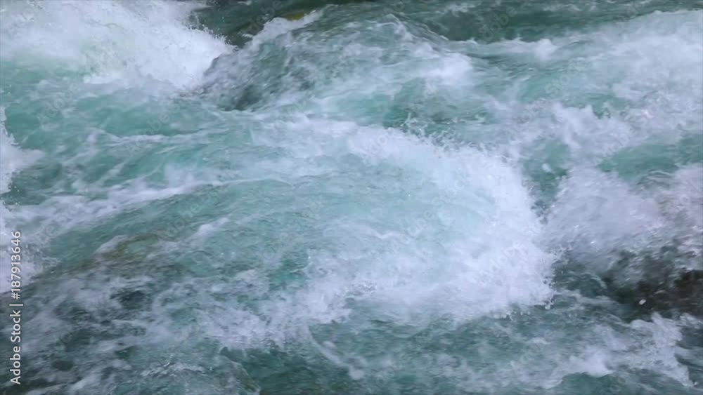 Mountain river water with slow motion closeup Mountain river water with slow motion closeup
