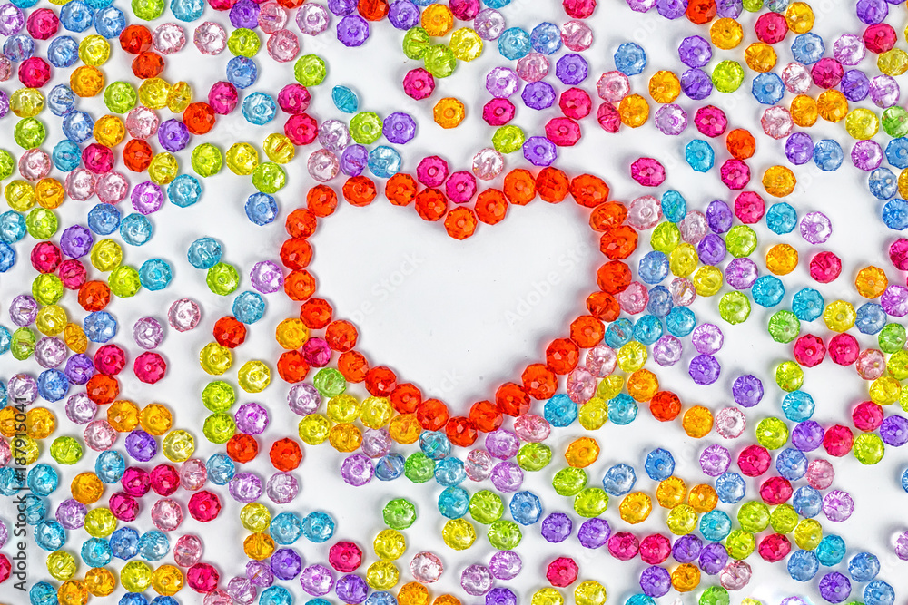 Background heart made of colored acrylic beads. Valentynes day