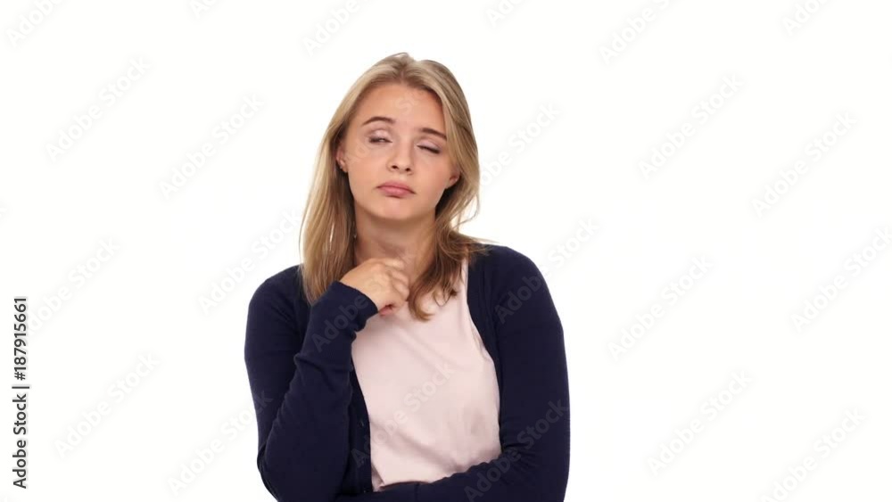 Thoughtful blonde woman in cardigan looking around and having idea over white background
Thoughtful blonde woman in cardigan looking around and having idea over white background