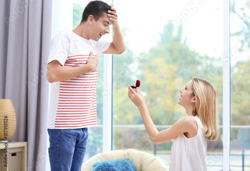 Woman with engagement ring ...