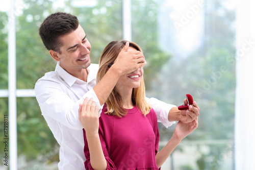 Man with engagement ring ma...