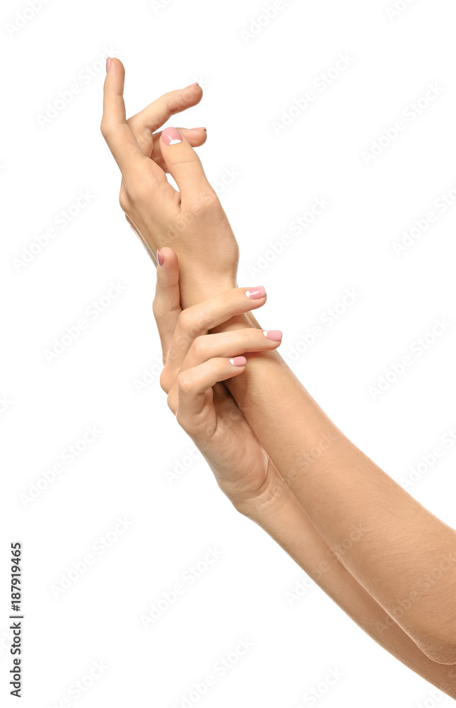 Hands of young woman with healthy skin softened by cream with moisturizing effect, on white background Hands of young woman with healthy skin softened by cream with moisturizing effect, on white background