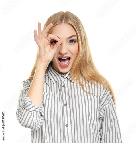 Young funny woman showing O...