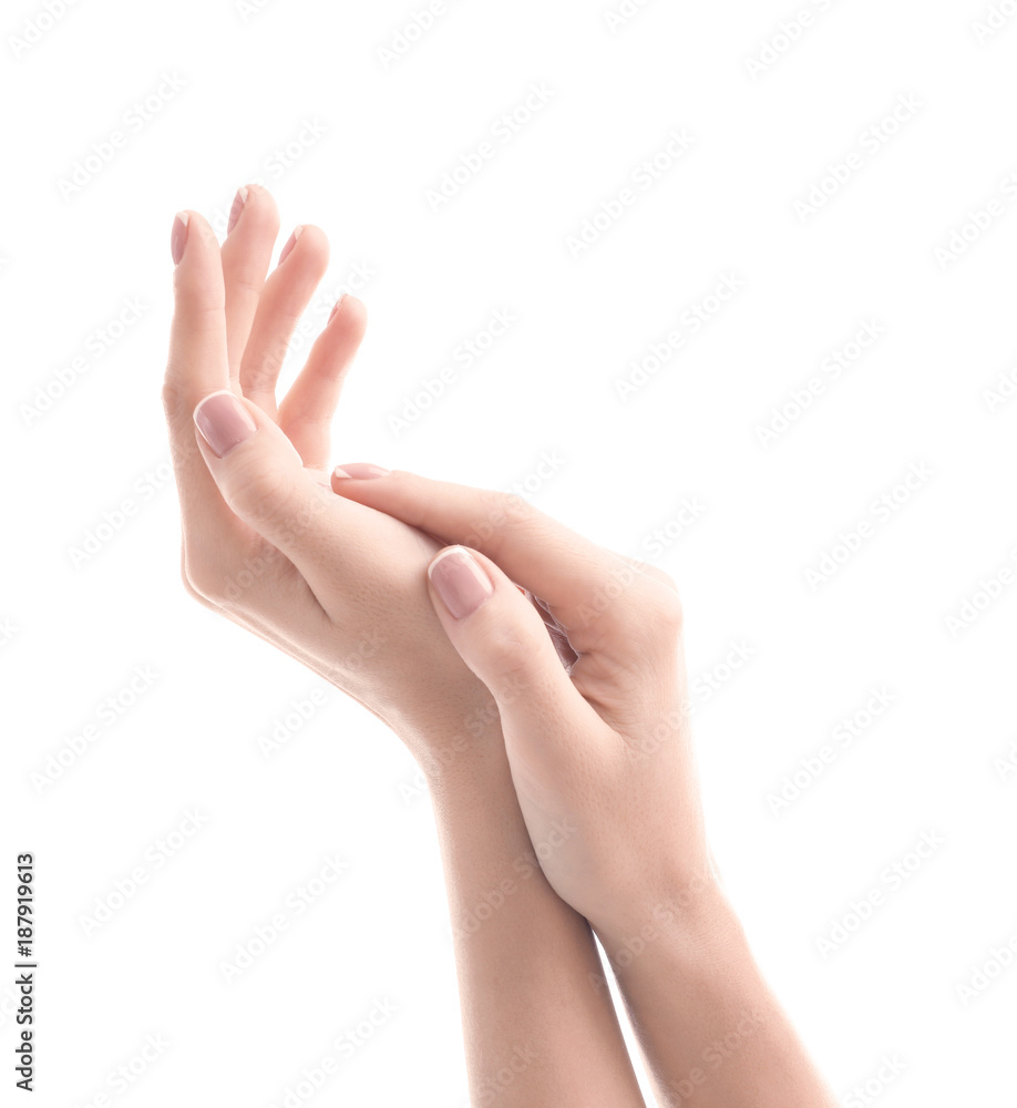 Young woman touching her hand and feeling moisturizing effect of cream on white background Young woman touching her hand and feeling moisturizing effect of cream on white background