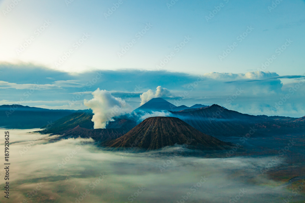 Mount Bromo volcano (Gunung Bromo), semeru and Batok during sunrise from viewpoint on Mount Penanjakan, in East Java, Indonesia.