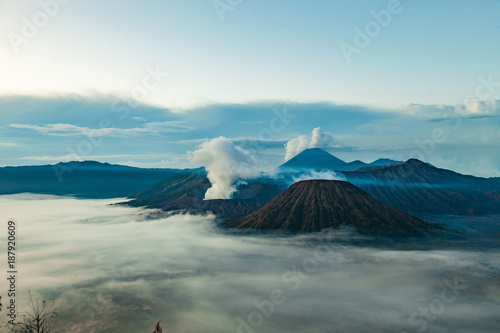 Mount Bromo volcano (Gunung Bromo), semeru and Batok during sunrise from viewpoint on Mount Penanjakan, in East Java, Indonesia.