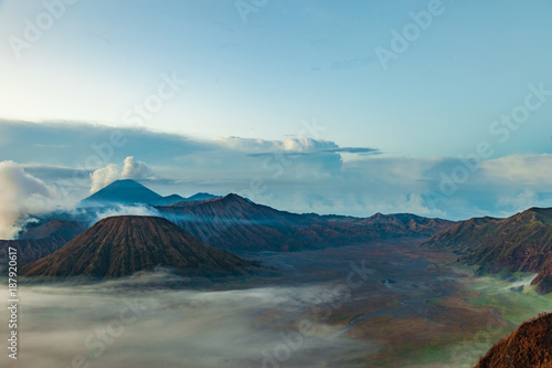 Mount Bromo volcano  Gunung Bromo   semeru and Batok during sunrise from viewpoint on Mount Penanjakan  in East Java  Indonesia.