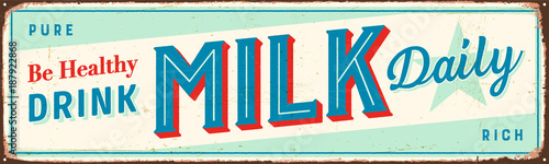 Vintage Metal Sign - Be Healthy Drink Milk Daily - Vector EPS 10 - Grunge and rusty effects can be easily removed for a cleaner look.