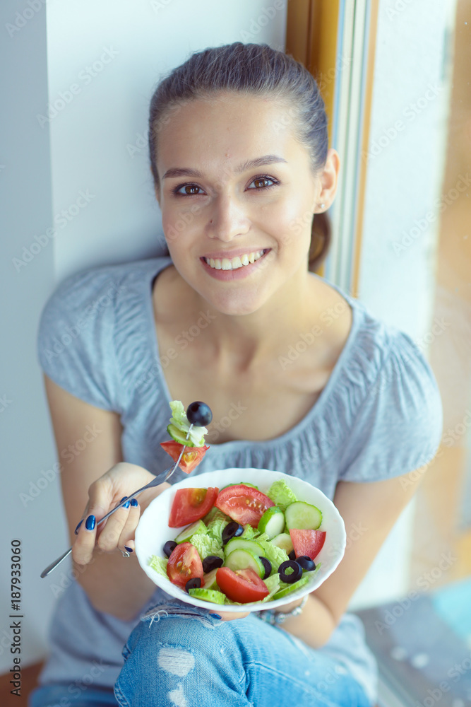 A beautiful girl eating healthy food. Beautiful girl A beautiful girl eating healthy food. Beautiful girl