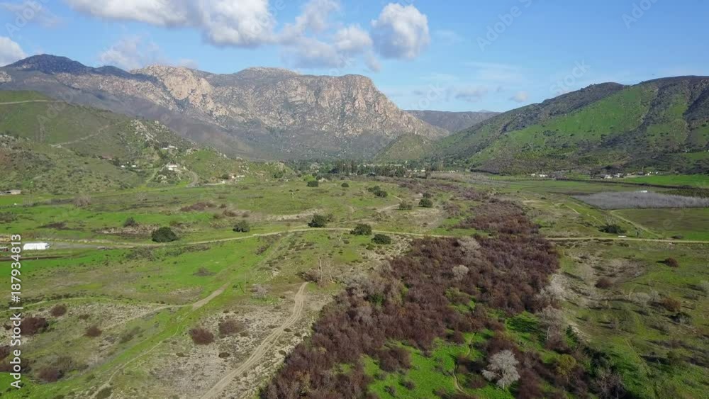 Lakeside, CA - San Diego River Valley - Drone Video Aerial Video of San Diego River Valley iconic mountains that forms the base of the valley. Lakeside, CA - San Diego River Valley - Drone Video Aerial Video of San Diego River Valley iconic mountains that forms the base of the valley.