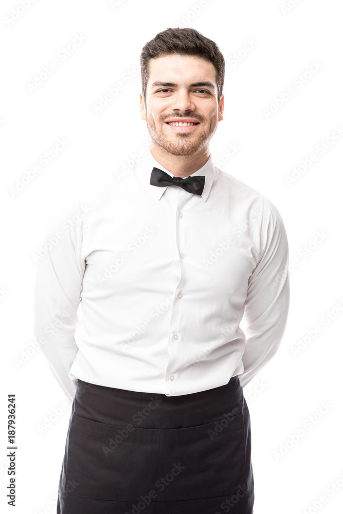 Young waiter ready to take your order Young waiter ready to take your order