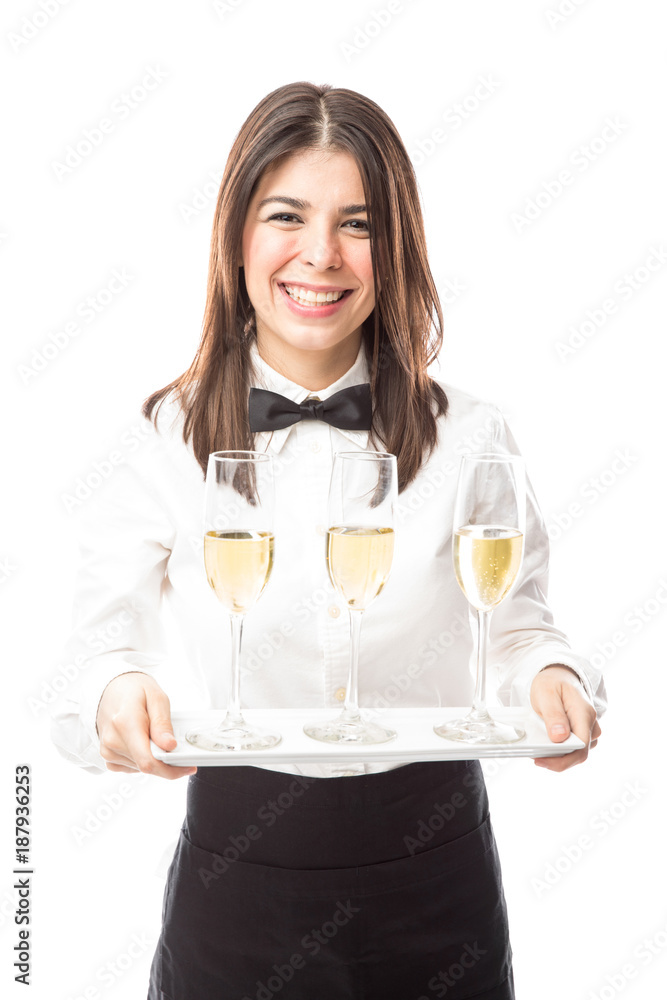 Waitress serving some champagne Waitress serving some champagne