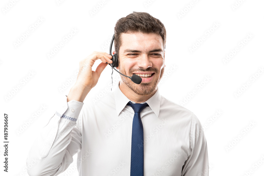 Sales rep smiling over a phone call Sales rep smiling over a phone call