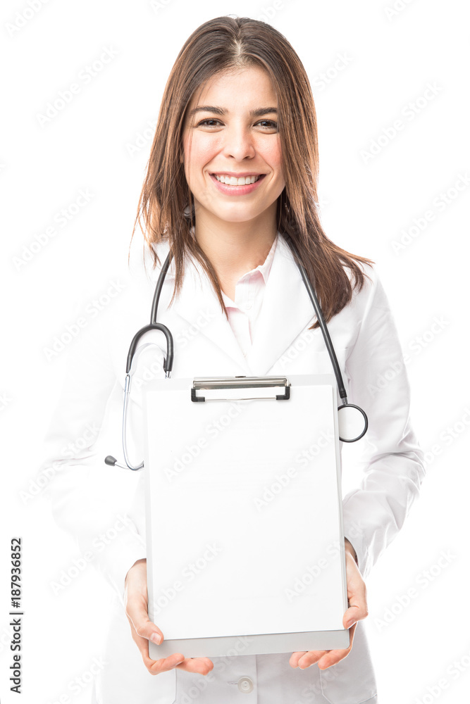 Female doctor showing a medical chart Female doctor showing a medical chart