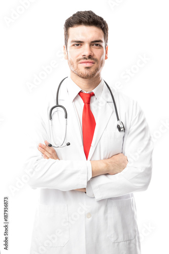 Confident doctor with arms crossed © AntonioDiaz
