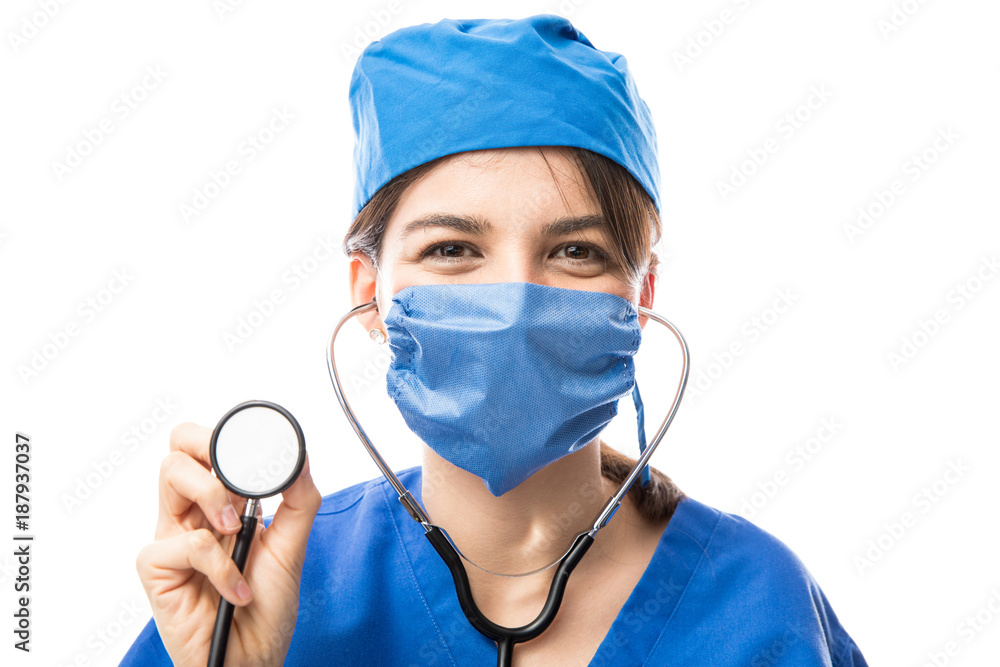 Female doctor using a stethoscope Female doctor using a stethoscope