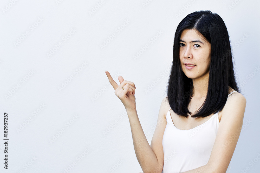 Young cute asian woman pointing Young cute asian woman pointing