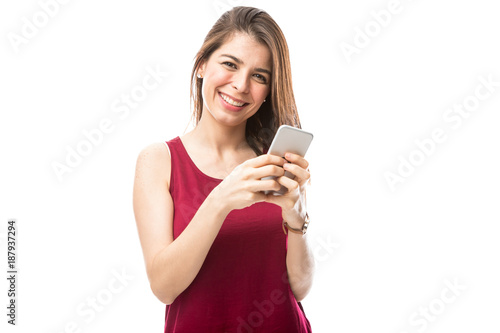 Cute woman using a smartphone