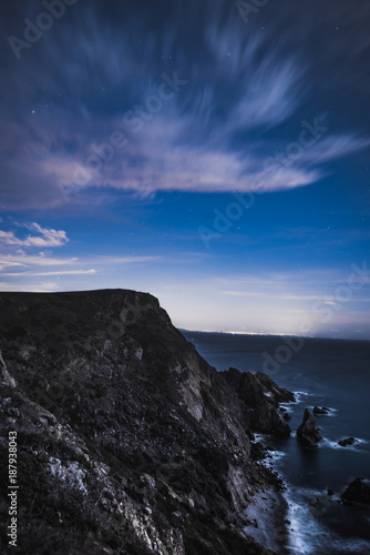 night shot of clouds in point reyes cliffside photo