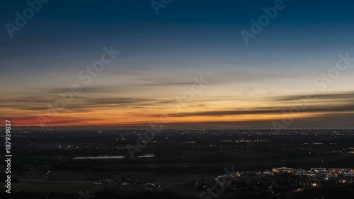 Timelapse of Milan city area and Po Valley, Italy at sunrise. Aerial View