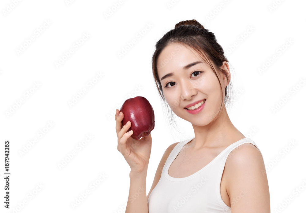 Happy healthy girl. Toothy smile portrait of a beautiful young woman, holding an apple, isolated on white. Happy healthy girl. Toothy smile portrait of a beautiful young woman, holding an apple, isolated on white.