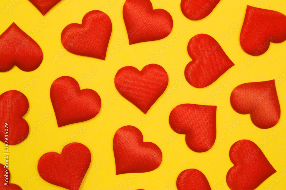 Heart Shaped Confetti Making a Valentines Day Background Heart Shaped Confetti Making a Valentines Day Background