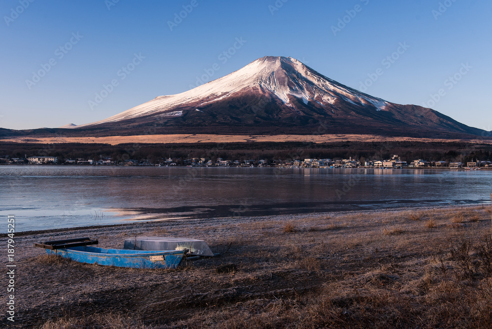Fishing boats in lake yamanaka with Mt.Fuji background