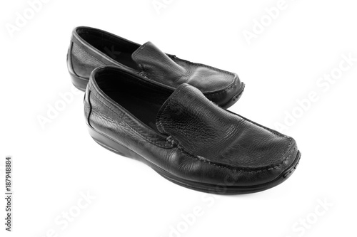 Black leather shoes isolated on white background with copy space.