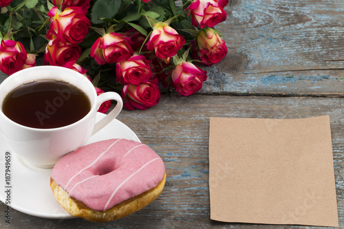 Breakfast for mother's day,Concept with flowers and gift card ,with empty space for a text