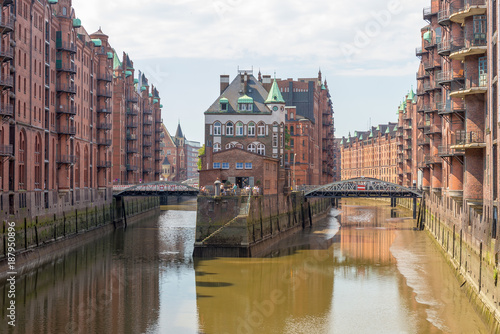 HAMBURG, GERMANY - JULY 20, 2016: Famous water castle in Speicherstadt. Hamburg attracts 10 million people annually