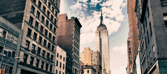 Wandcirkels Empire State Building Kleurrijke architectuur van New York  © jovannig