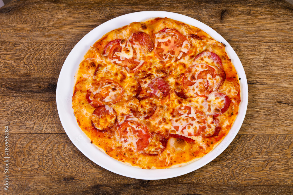 Pepperoni pizza with sausages Pepperoni pizza with sausages