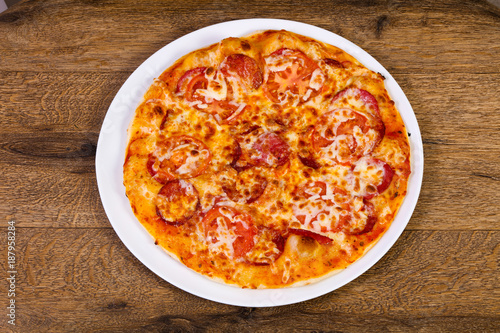 Pepperoni pizza with sausages