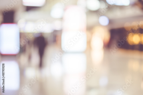 Blurred background,Traveler with baggage at Terminal Departure Check-in at airport with bokeh light,transportation concept.