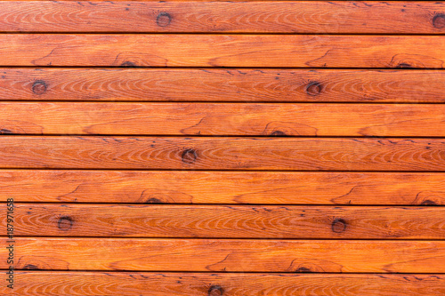 Wooden boards are covered with lacquer - background