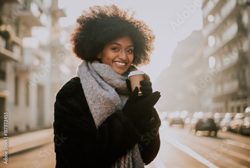Photography Beautiful girl with afro haircut walking on the street