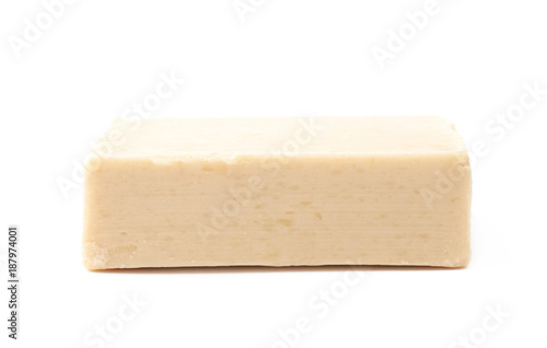 Beige piece of soap isolated